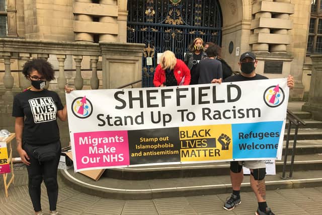 Demonstrators took the knee outside Sheffield Town Hall on Friday evening.