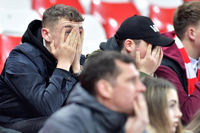It's not all fun and games as we know, the agony on these fans' faces.