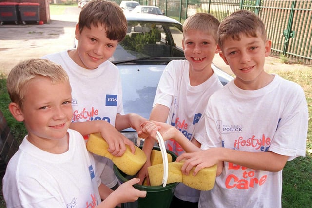 Lifestyle group Whizzkids got down to a spot of fund-raising by washing cars at their school in 1999. They are, from left, David Mellon, Alex Dickson, Adam Hewitt and Karl Cooper, all aged ten.
