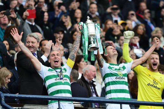 Mikael Lustig (R), and Scott Brown celebrate winning the Scottish Cup against Hearts at Hampden Park in May 2019