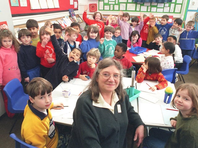 Headteacher Pat Barry pictured with some of her pupils at Broomhill Infants School in February 2000