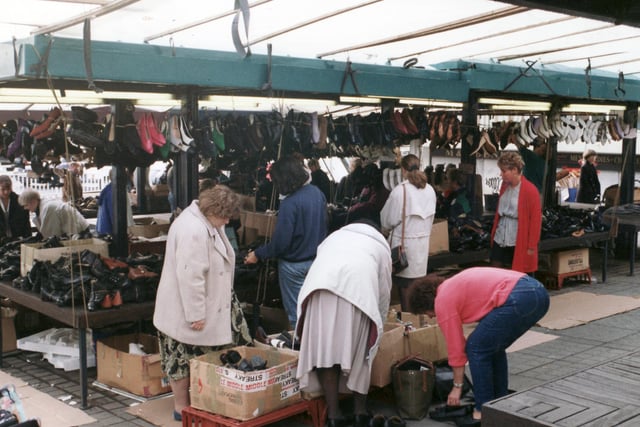 Rummaging for bargain shoes at the weekly Setts Market sale on September 10, 1993. It used to be a regular early morning ritual for lots of fashion fans