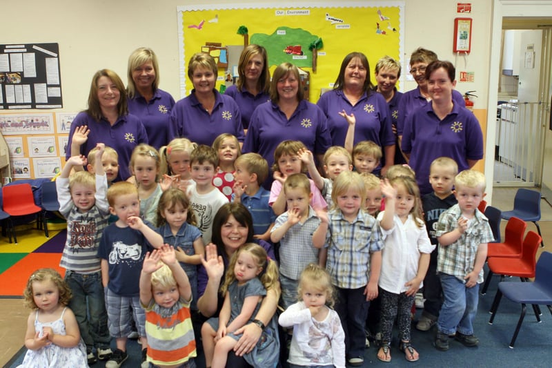 Marsh Lane playgroup youngsters and leaders celebrate an outstanding Ofsted report in 2010.