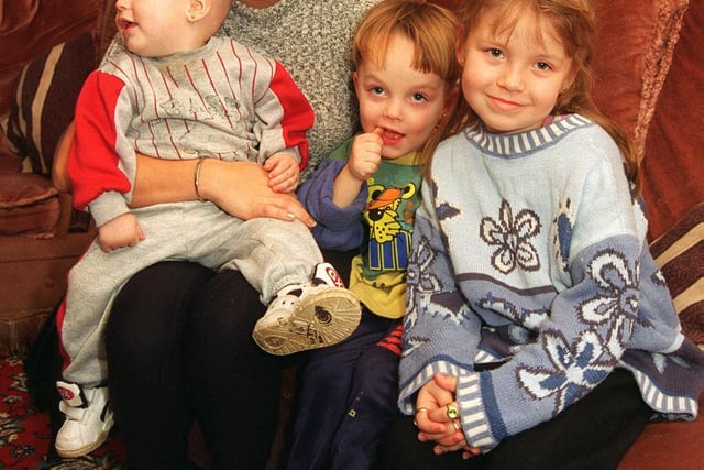 Karen Pulford with her children  Stacey, Adam and Aiden, at their home on  Southey Hall Road, Southey Green, Sheffield in 1997.