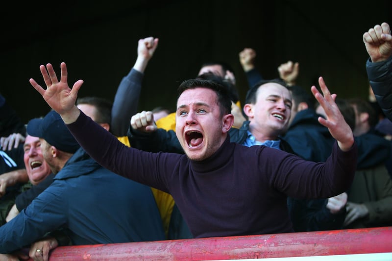 A Sunderland fan celebrates his side's third goal during the Sky Bet Championship match between Brentford and Sunderland at Griffin Park.