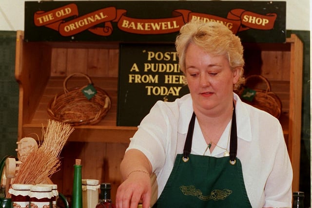 Gill Salmon manager of the Bakewell Pudding shop puts the finishing touches to her display in 1997