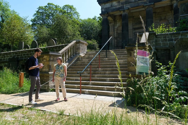 The stairs outside Samuel Worth Chapel, which used to be perilously unaligned, have been re-set by masons according to historic photographs. Pictured here is project manager Claire Watts.