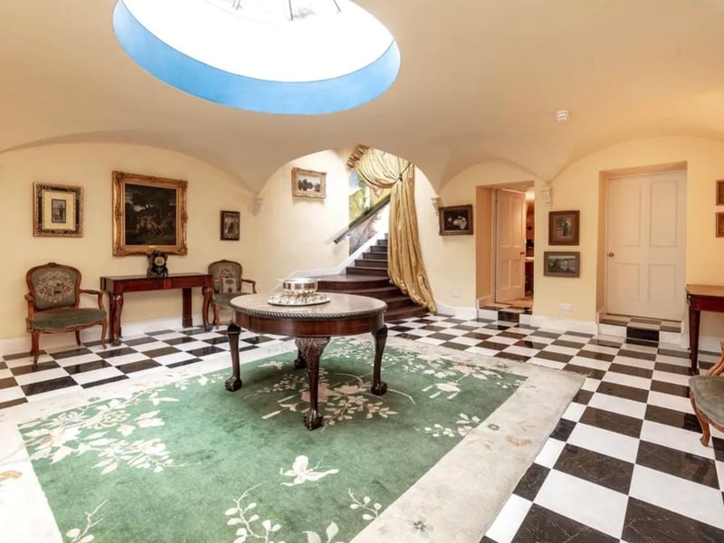 This 15 bedroom house is on the market in Ayrshire for offers over £2,200,000 and includes eight acres of land and well as a cinema, gym and games room.