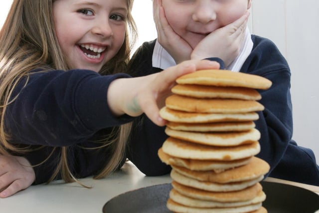 Calow primary pupil Olivia Titchener and Daniel Twigg enjoyed pancake day in 2011