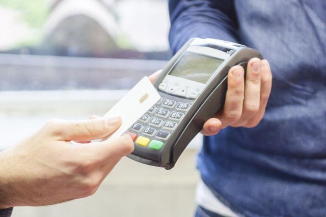 The idea of waving your card at a little screen to pay for your groceries was pure fantasy in 1998. Most people used cash, and, when they did pay with plastic, it involved signing a piece of paper and a store clerk checking it against the signature on the back of your debit card.