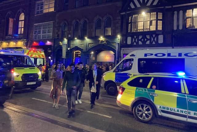 Emergency services on West Street in Sheffield city centre, where a young woman stopped breathing and a volunteer Street Pastor and a doorman performed CPR before paramedics arrived (pic: Sheffield Street Pastors)