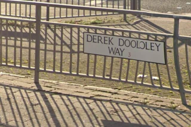 A man was reportedly hit by a car on Derek Dooley Way before two men got out the vehicle, assaulted him and later took his bank card and phone case.