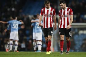 Sheffield United defender John Egan (R) will be supporting Union Berlin in the Bundesliga, when it returns to action today: Simon Bellis/Sportimage