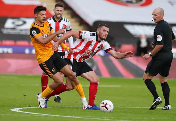 Jack O'Connell of Sheffield Utd (C) evades the challenge from Raul Jimenez of Wolverhampton Wanderers: Simon Bellis/Sportimage