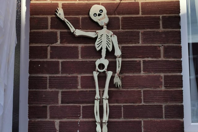 Maria Ann Brannen's skeleton gives us a wave!