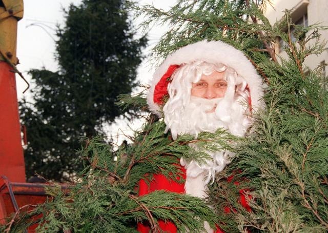 Dave Pawson dressed as Santa to promote the Council's plan to recycle Christmas trees in 1999.