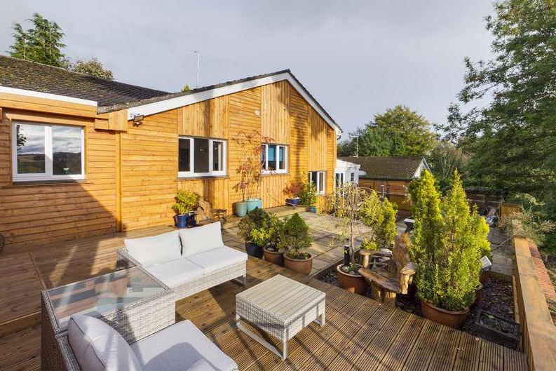 The rear of the property has been clad in timber, providing an Alpine Lodge feel.
