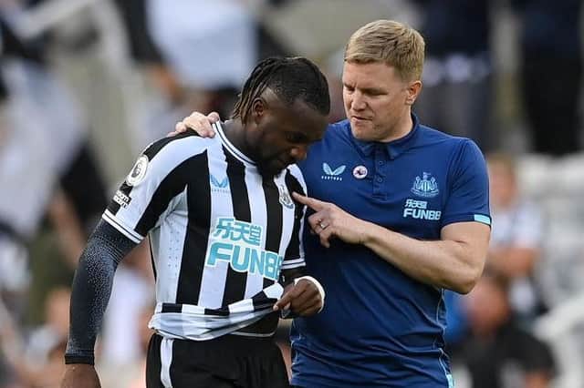 Allan Saint-Maximin of Newcastle United talks with Eddie Howe, Manager of Newcastle United, after the final whistle of the Premier League match between Newcastle United and Manchester City at St. James Park on August 21, 2022 in Newcastle upon Tyne, England. (Photo by Stu Forster/Getty Images)
