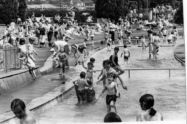 Heat wave at paddling pool in Millhouses Park, Sheffield. 2nd June 1982