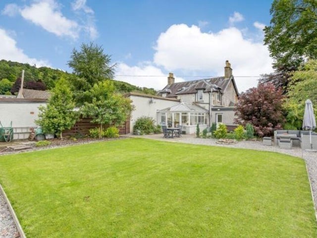 New owners can enjoy the spacious garden.