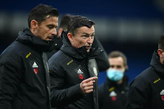Sheffield United's Interim manager Paul Heckingbottom (C) during the English Premier League football match between Everton and Sheffield United (GARETH COPLEY/POOL/AFP via Getty Images)