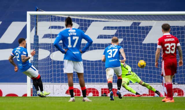 GLASGOW, SCOTLAND - NOVEMBER 22: Rangers' James Tavernier (L) makes it 4-0 with a penalty during a Scottish Premiership match between Rangers and Aberdeen at Ibrox Stadium, on November 22, 2020, in Glasgow, Scotland (Photo by Craig Foy / SNS Group)