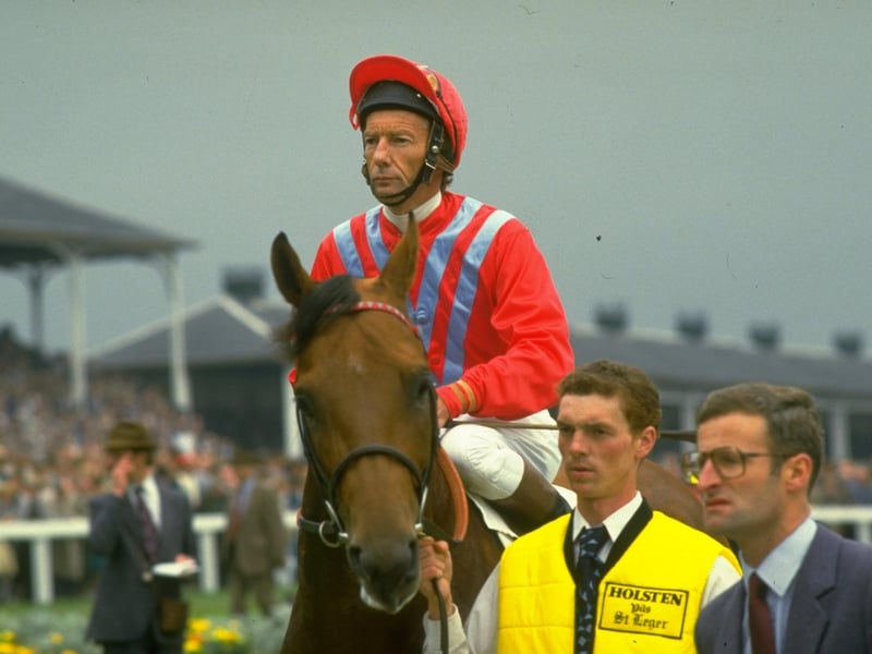 Legendary jockey Lester Piggott on Commanche Run before the St. Leger at Doncaster in 1984. Piggot won the race and broke the all time Classic winning record by achieving his 28th Classic win. 