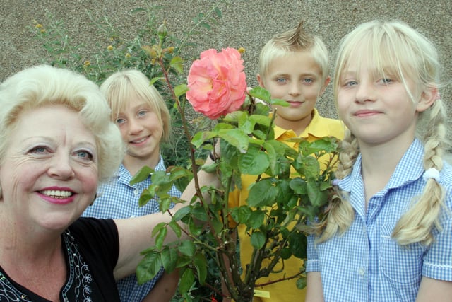 Hady school teacher retiring after 32yrs. Pictured with her rose in the Chesterfield in Bloom Garden in 2006.   l to r Judith Sensecall,Lauren Andrews 10yrs, Kyle Perrins 10yrs and Katherine Andrews 10yrs.