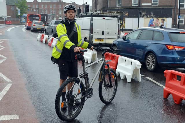 The Star's business editor David Walsh tests out the new cycle lane at Shalesmoor. Photo: Brian Eyre.