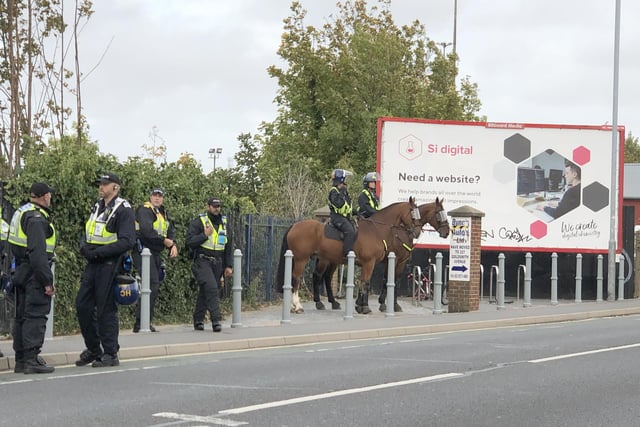 Police officers wait outside Fratton station, in Goldsmith Avenue, for the impending arrival of Southampton fans ahead of the two teams' Carabao Cup match on Tuesday, September 24. 

Picture: Byron Melton (240919-2969)