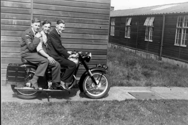 Leading Aircraftman Ted Caton, right, and two of his National Service pals at RAF Norton in 1953 - the motorbike is a Norton