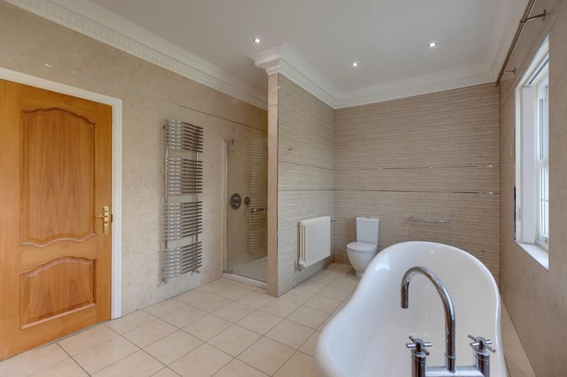 The master ensuite is described as a "sumptuous en-suite bathroom", with a suite in white, which comprises of a low-level WC, bidet and twin wash hand basins, alongside a bath and separate shower enclosure.