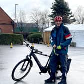 Dr Ollie Hart with his e-bike at Heeley vaccine hub