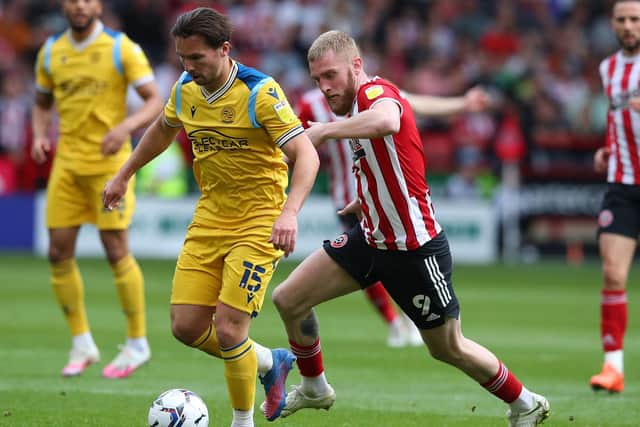 Sheffield United striker Oli McBurnie later limped-out of the game against Reading: Simon Bellis / Sportimage