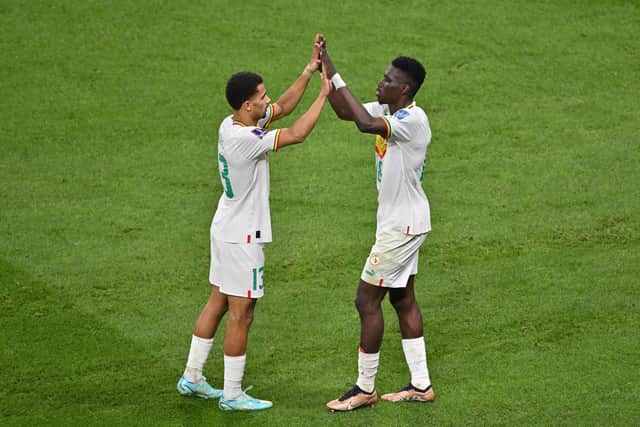 Senegal and Sheffield United forward Iliman Ndiaye (left) is at the World Cup: JUNG YEON-JE/AFP via Getty Images
