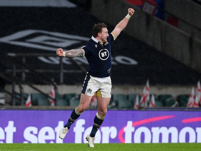 Stuart Hogg of Scotland celebrates following their side's victory after the Guinness Six Nations match between England and Scotland at Twickenham Stadium