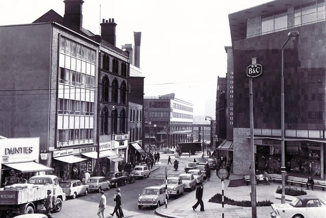 A view of Castle Street, Sheffield in August 1964, looking towards the new Castle Market building and Brightside & Carbrook Co-op store on the right, which now houses fashionable eating place Kommune