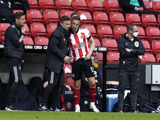 Sheffield, England, 23rd May 2021. Phil Jagielka of Sheffield Utd (R) talks to manager Paul Heckingbottom during the Premier League match at Bramall Lane, Sheffield. Picture credit should read: Andrew Yates / Sportimage