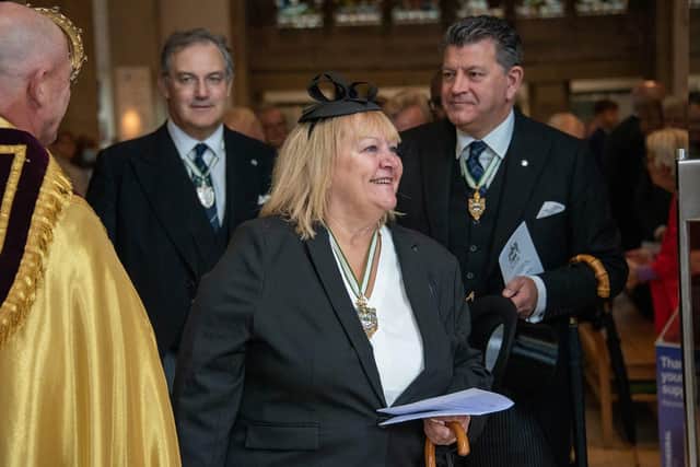 
The Master Cutler Dame Julie Kenny DBE DL is pictured at her installation, with outgoing Master James Tear (right) and Senior Warden Charles Turner (left)
 