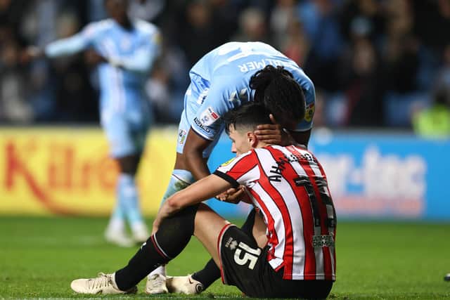 Anel Ahmedhodzic of Sheffield United looks down in the dumps following Wednesday's defeat by Coventry City: Darren Staples / Sportimage