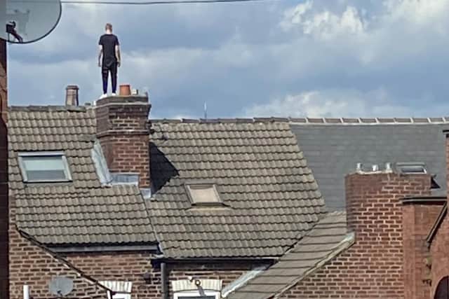 The emergency services were called out at 4.51am this morning (Monday, August 8) after receiving reports of concern for the man, after he was seen on the roof of a property on Chesterfield Road, in Heeley, Sheffield. Picture: Martin Webb