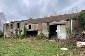 Full planning permission is in place to restore the farmhouse at Manor Syck Farm, Old Whittington and convert three barns into houses.