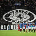 Rangers' players observe a minute's silence for legendary manager Walter Smith, who passed away aged 73 earlier this week: Alan Harvey / SNS Group