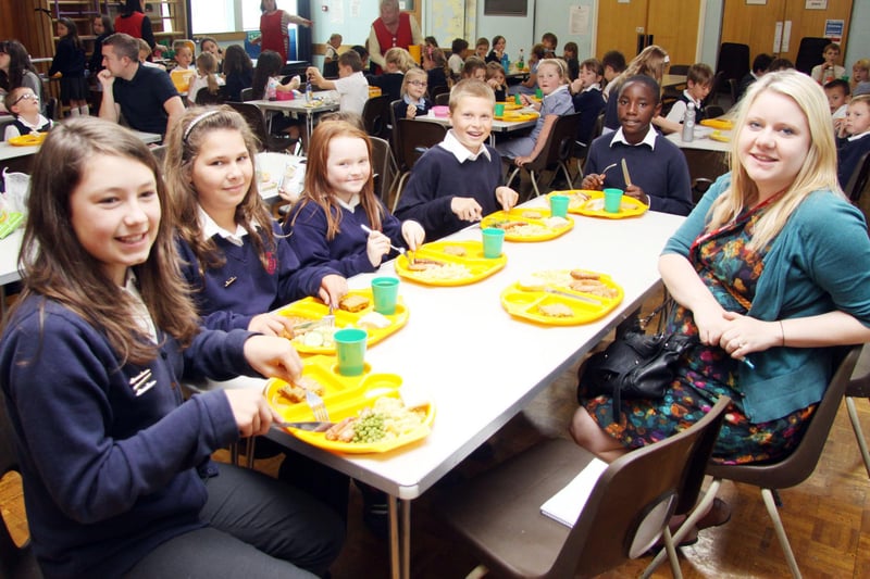 Some Calow School students tucking into their school meals