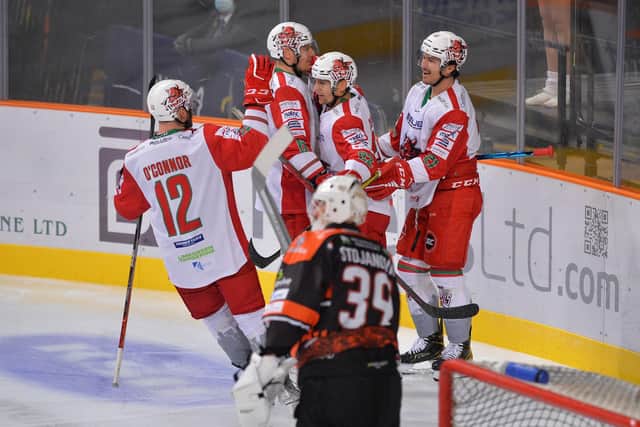 Cardiff Devils celebrate their win over Sheffield Steelers.