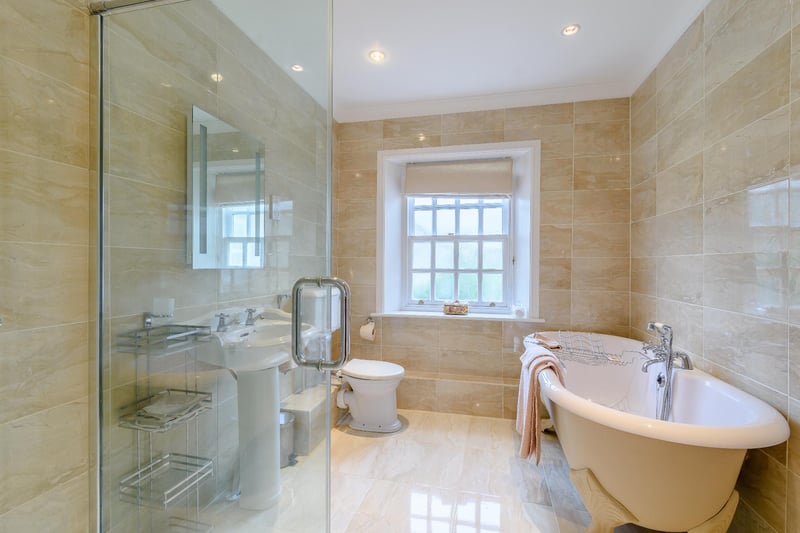 There is a modern en suite shower room and two contemporary family bathrooms.