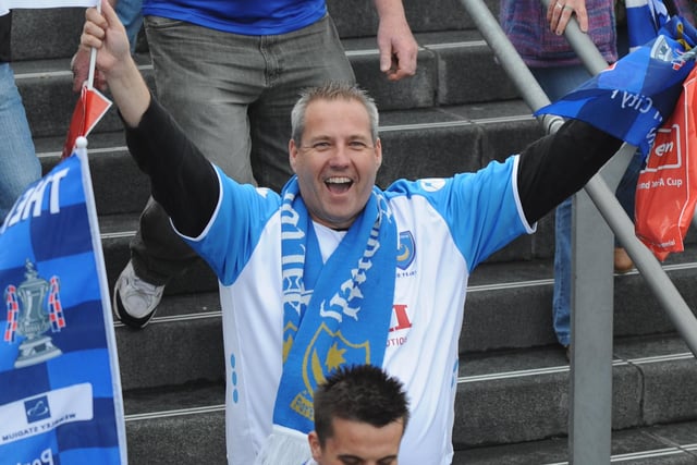 A fan celebrates the Blues' triumph.
