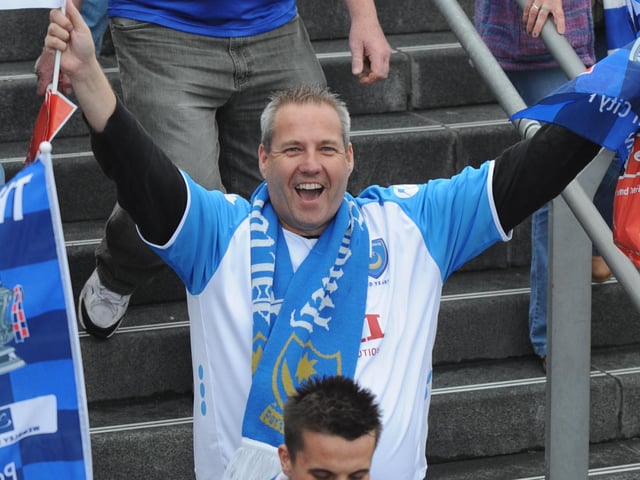 A fan celebrates the Blues' triumph.