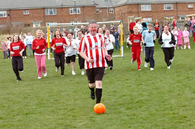 Teaching assistant Brian Newby is chased by parents and teachers from Grangetown Primary School during a Red Nose football match 11 years ago.