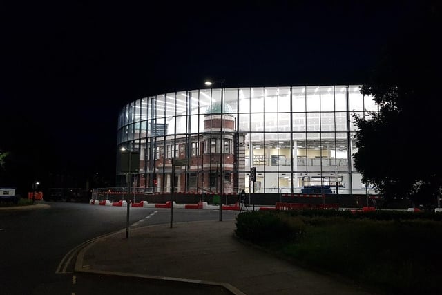 The illuminated frontage of the Doncaster Gallery, Library and Museum viewed from Wood Street